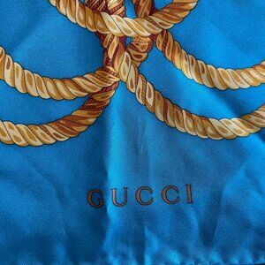 100% Authentic Gucci Silk Scarf with Gold Rope Design on Turquoise Background